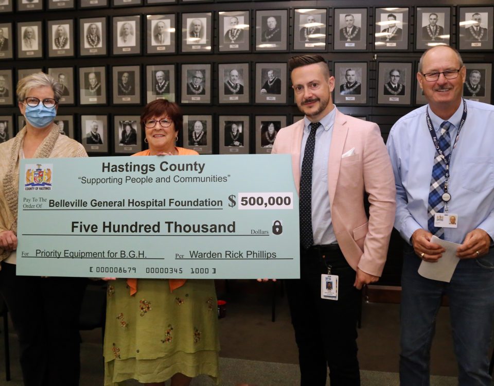 The Belleville General Hospital Foundation's Jan Summers, left, and Steve Cook, second from right, accept Hastings County council's $500,000 cheque from county finance committee chair Jo-Anne Albert and Warden Rick Phillips Tuesday, June 21, 2022 in Belleville, Ont. Luke Hendry/The Intelligencer/Postmedia Network

