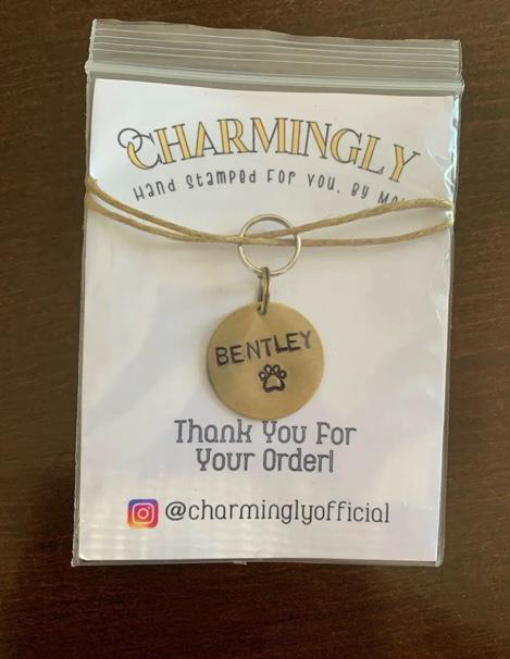 a custom dog tag in a package